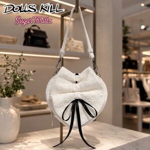 Dolls Kill Eyelet Heart Bag